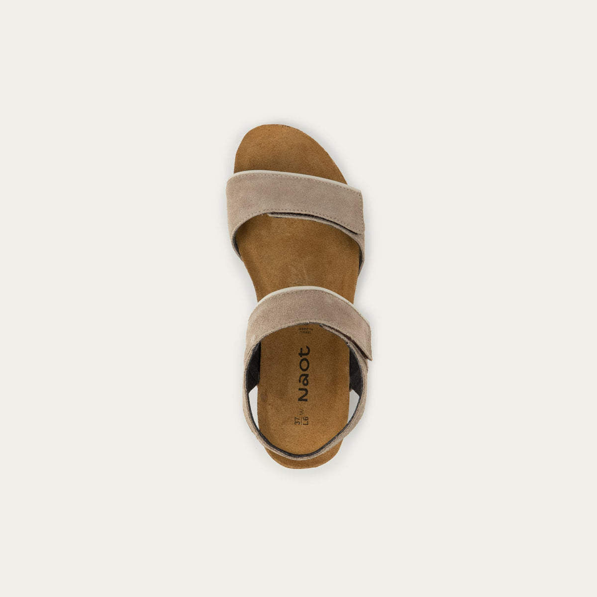 Beige suede sandal with a cork platform sole.
