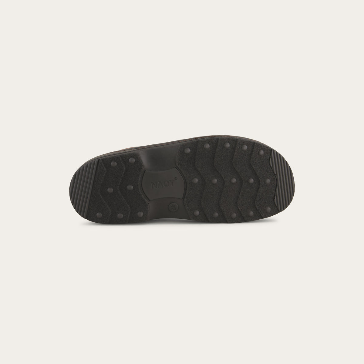 Bottom view of a brown nubuck sandal featuring 3 hook and loop straps around the foot and ankle for adjustability on a black sole.