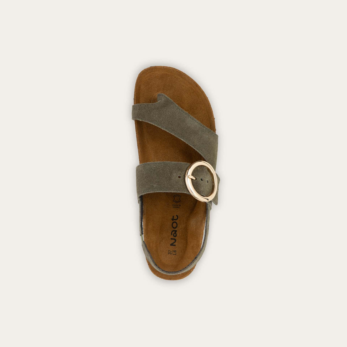 Top view of a green strappy slide with an oversized buckle and a toe thong, featuring a cork sole.