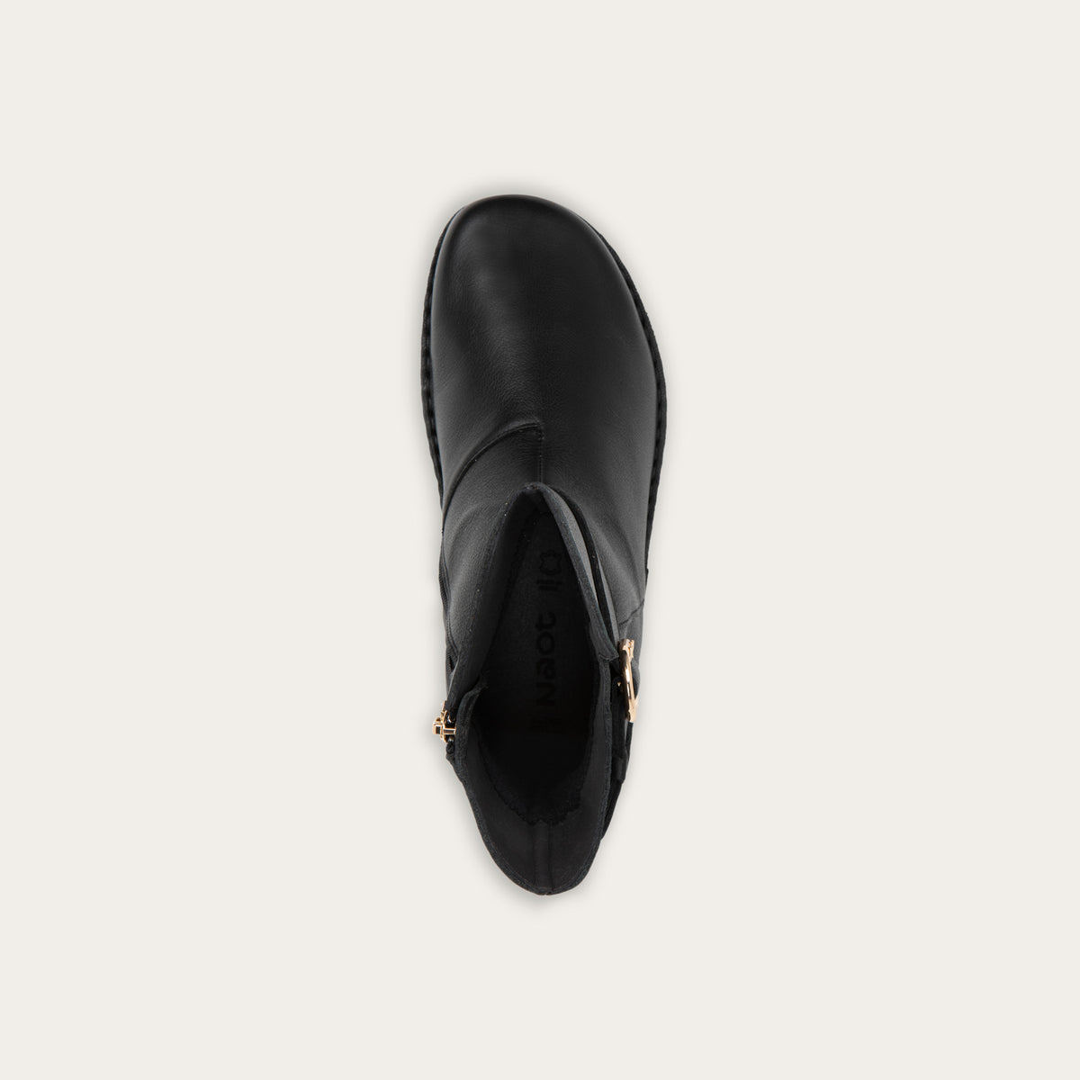 Top view of a black calf boot with a simple strap and buckle detail