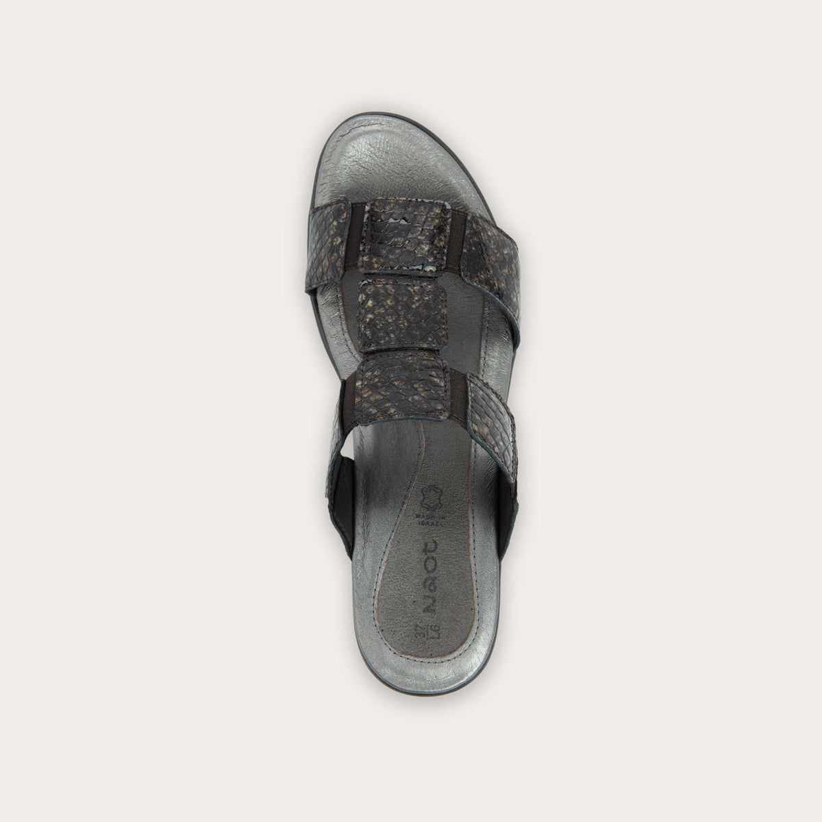 Top view of a slip-on t-strap reptile printed sandal with a mid-height heel .