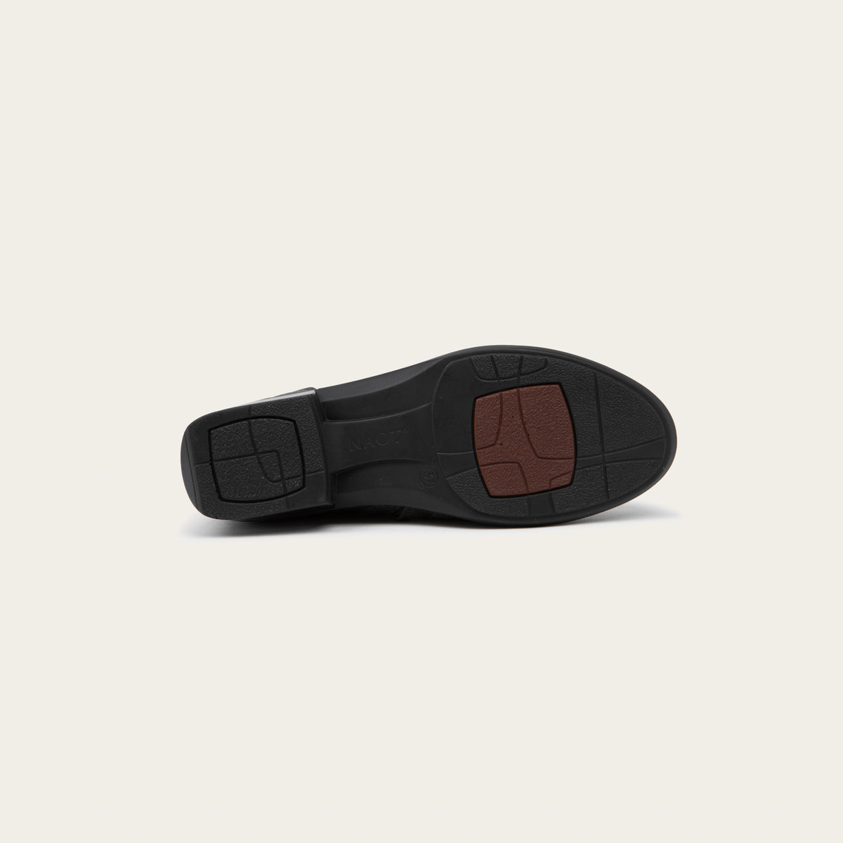Bottom view of a black suede mid-calf boot with decorative t-strap and buckle, side zipper, rounded toe, and low stacked heel