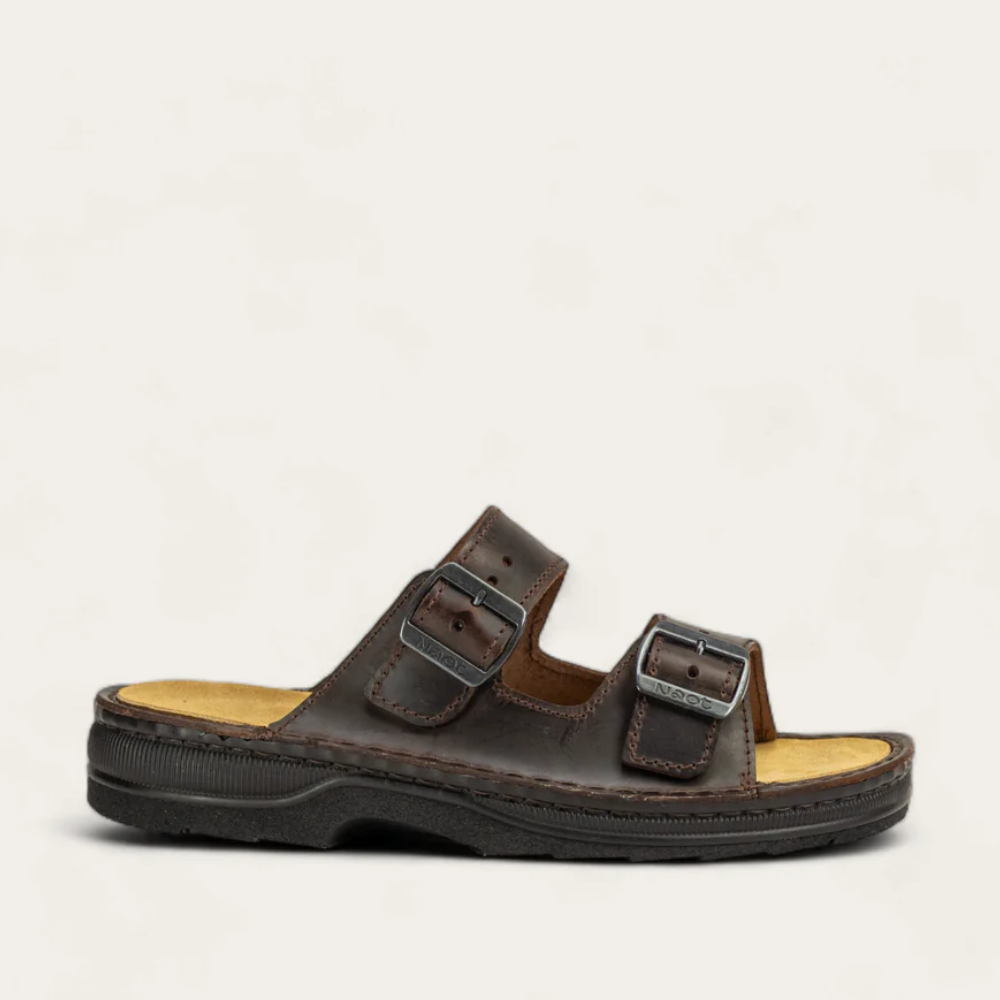 A brown, two-strap slide sandal with adjustable buckles and a thick sole.