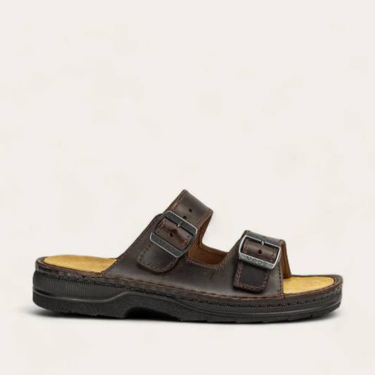 A brown, two-strap slide sandal with adjustable buckles and a thick sole.