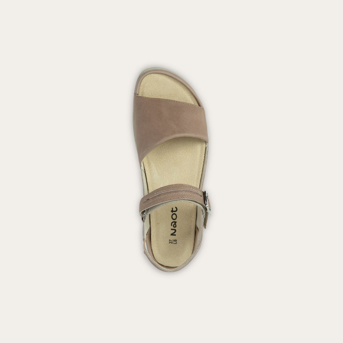 Top view of a beige, open toe sandal, featuring a toe strap and asjustable ankle strap with a silver accent buckle.