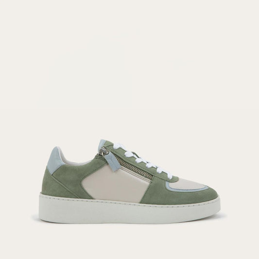 Profile view of a multicolored green and white sneaker with laces and a side zipper.