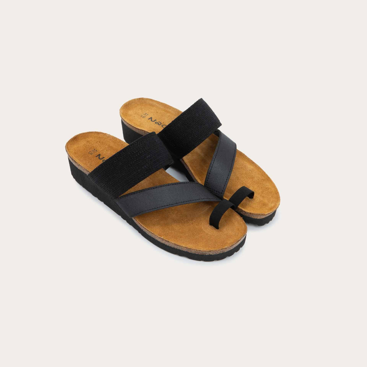 Pair of black, multi-strap slided with a toe loop and a cork footbed.
