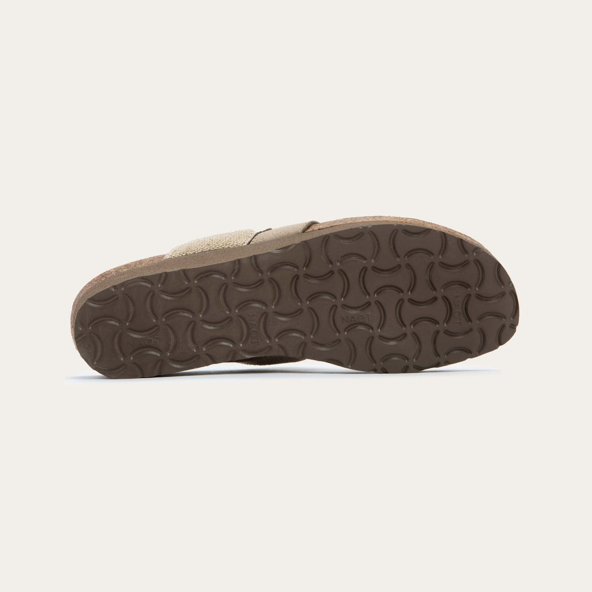 Bottom view of beige, multi-strap, sling-back sandal with a cork footbed.