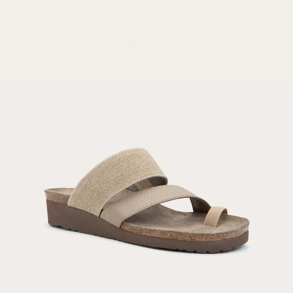 Angled profile view of beige, multi-strap, sling-back sandal with a cork footbed.